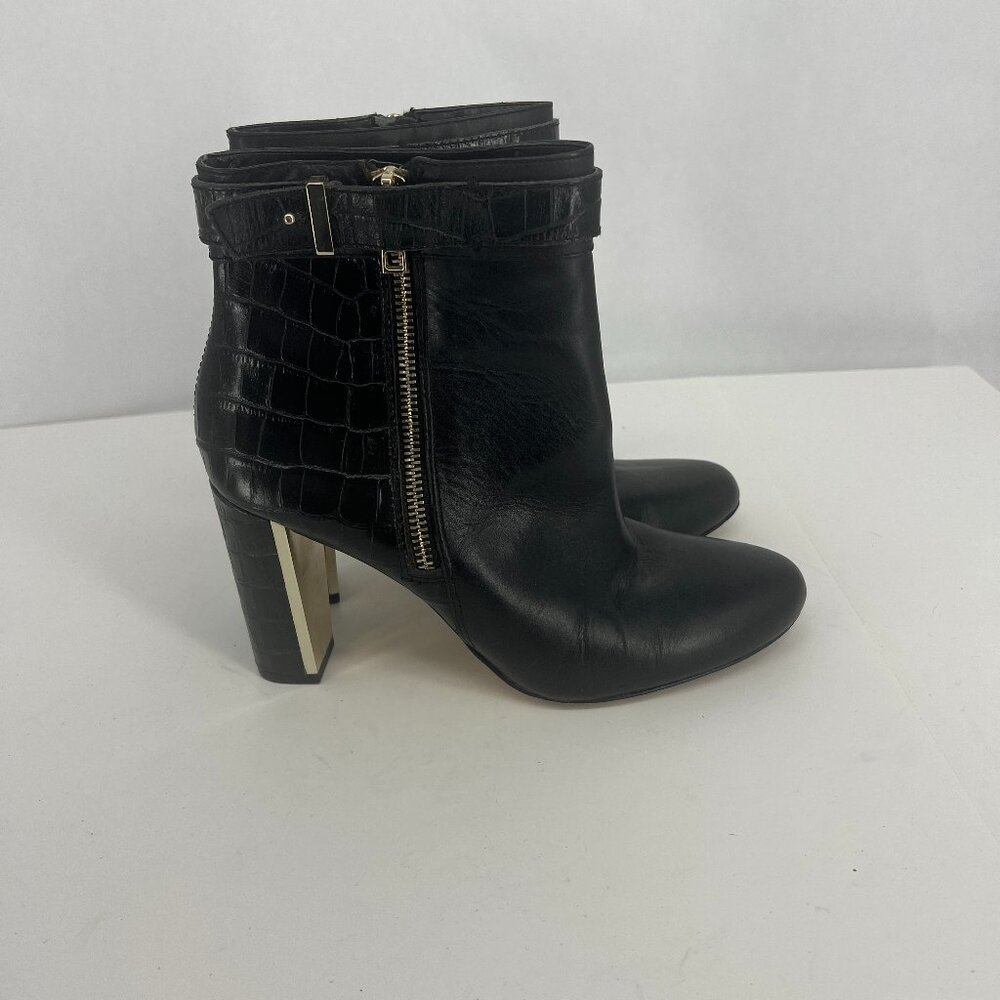 Ann Taylor gold heel black ankle boots with side zipper.